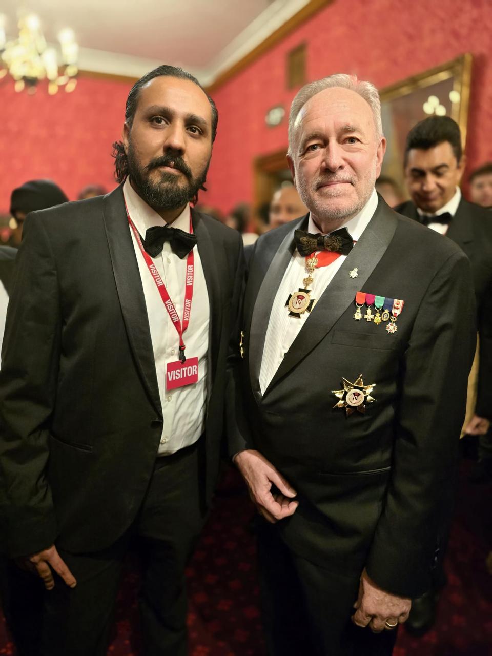 Ahmed Junaid photographed with a decorated guest